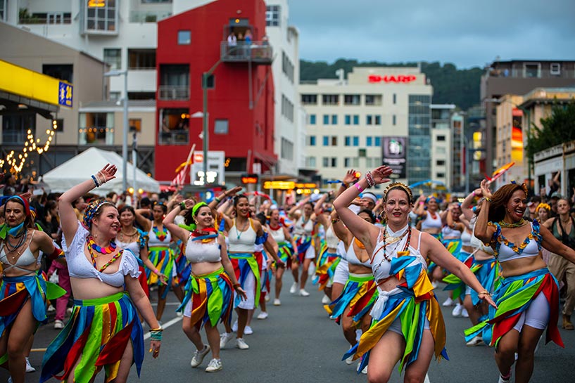 Performers in colourful costumes dance in CubaDupa